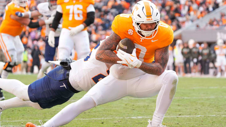 Tennessee tight end Ethan Davis (0) is tackled during a NCAA football game between Tennessee and UTEP in Neyland Stadium on Saturday, November 23, 2024.