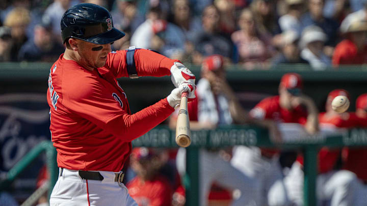 Feb 23, 2025; Fort Myers, Florida, USA; Boston Red Sox infielder Alex Bregman (2) connects with the ball for a double in the fourth inning of their game against the Toronto Blue Jays at JetBlue Park at Fenway South.