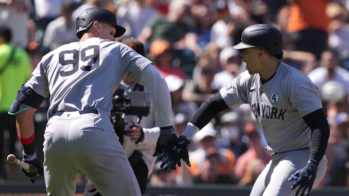 Jun 2, 2024; San Francisco, California, USA; New York Yankees right fielder Juan Soto (right) celebrates with center fielder Aaron Judge (99) after hitting a home run against the San Francisco Giants during the ninth inning at Oracle Park.