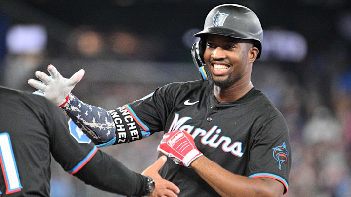 Sep 28, 2024; Toronto, Ontario, CAN;   Miami Marlins right fielder Jesus Sanchez (12) celebrates after hitting a single against the Toronto Blue Jays in the eighth inning at Rogers Centre