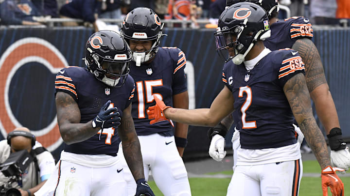 D'Andre Swift (left) celebrates with Rome Odunze (15) and DJ Moore after a 36-yard touchdown run in Sunday's Bears win. D'Andre Swift (left) celebrates with Rome Odunze (15) and DJ Moore after a 36-yard touchdown run in Sunday's Bears win.