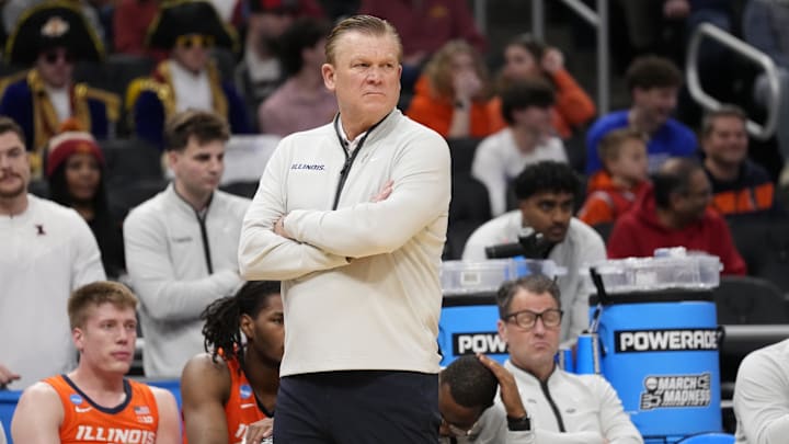 Mar 23, 2025; Milwaukee, WI, USA; Illinois Fighting Illini head coach Brad Underwood reacts during the first half in the second round of the NCAA Tournament against the Kentucky Wildcats at Fiserv Forum. Mandatory Credit: Jeff Hanisch-Imagn Images Mar 23, 2025; Milwaukee, WI, USA; Illinois Fighting Illini head coach Brad Underwood reacts during the first half in the second round of the NCAA Tournament against the Kentucky Wildcats at Fiserv Forum. Mandatory Credit: Jeff Hanisch-Imagn Images