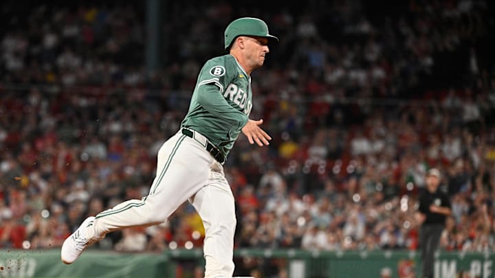 May 16, 2025; Boston, Massachusetts, USA; Boston Red Sox third base Alex Bregman (2) scores on a RBI single by shortstop Trevor Story (not pictured) during the ninth inning against the Atlanta Braves at Fenway Park. Mandatory Credit: Eric Canha-Imagn Images May 16, 2025; Boston, Massachusetts, USA; Boston Red Sox third base Alex Bregman (2) scores on a RBI single by shortstop Trevor Story (not pictured) during the ninth inning against the Atlanta Braves at Fenway Park. Mandatory Credit: Eric Canha-Imagn Images