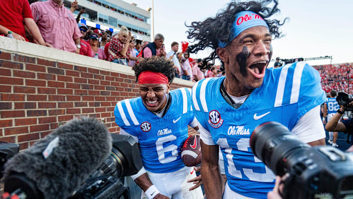 Ole Miss quarterback Trinidad Chambliss (6) and quarterback Austin Simmons (13) celebrate after a college football game between Ole Miss and LSU at Vaught-Hemingway Stadium in Oxford, Miss., on Saturday, Sept. 27, 2025. Ole Miss defeated LSU 24-19.