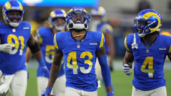 Dec 17, 2023; Inglewood, California, USA; Los Angeles Rams safety John Johnson III (43) celebrates after intercepting a pass against the Washington Commanders in the second half at SoFi Stadium. Mandatory Credit: Kirby Lee-Imagn Images