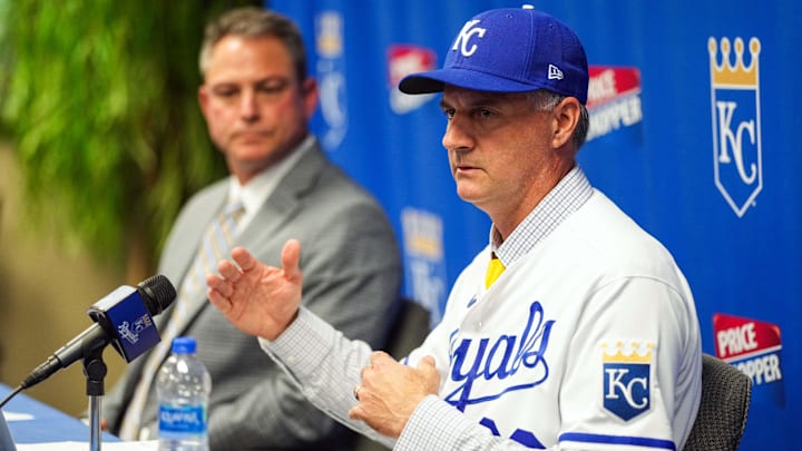 Nov 3, 2022; Kansas City, Missouri, USA; Kansas City Royals manager Matt Quatraro (33) and general manager J.J. Picollo talk with media during a press conference at Kauffman Stadium. Mandatory Credit: Jay Biggerstaff-Imagn Images