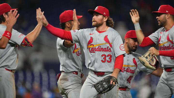 Jun 17, 2024; Miami, Florida, USA;  St. Louis Cardinals left fielder Brendan Donovan (33) celebrates a victory against the Miami Marlins with teammates at loanDepot Park. Mandatory Credit: Jim Rassol-USA TODAY Sports