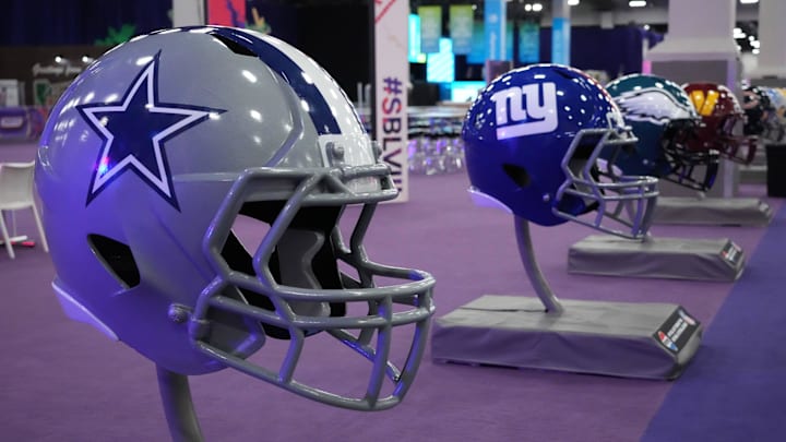 Feb 9, 2024; Las Vegas, NV, USA; Large Dallas Cowboys and New York Giants helmets at the NFL Experience at the Mandalay Bay South Convention Center. Mandatory Credit: Kirby Lee-Imagn Images