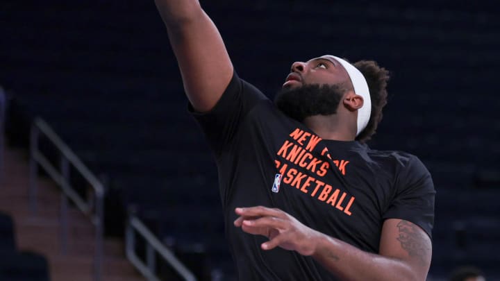 Apr 22, 2024; New York, New York, USA;  New York Knicks center Mitchell Robinson (23) warms up