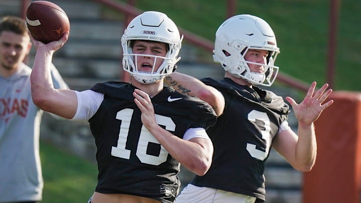 Texas Longhorns quarter backs Arch Manning and Quinn Ewers throws the football during Texas Longhorns football spring practice at the Frank Denius practice fields in Austin Wednesday, March 8, 2023. Quarterbacks