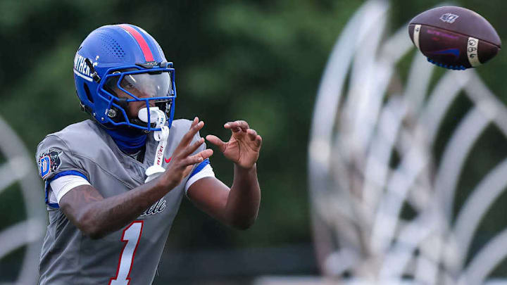 Duncanville's Dakorien Moore, 5-star Oregon Ducks commit, warms up for ranked high school tilt with Maryland's St. Frances Academy on Sept. 14, 2024.