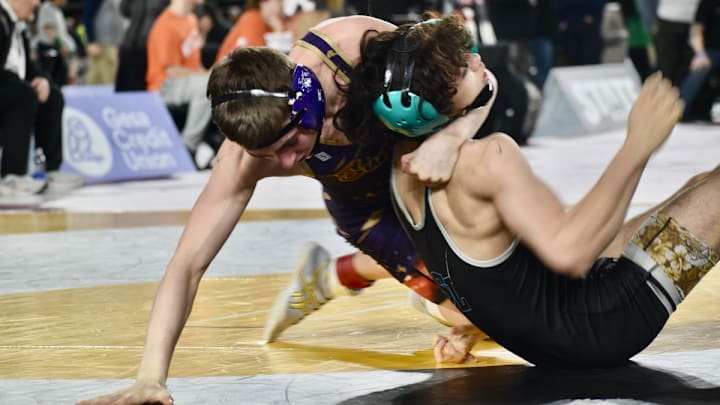 Hoyt Harshman, of Sumner, registers a fall over Spanaway Lake's Jayden Vu in 1:25 in Class 4A 113-pound semifinals Friday at Mat Classic.