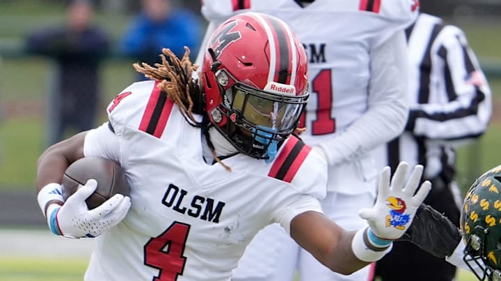 Orchard Lake St. Mary’s wide receiver Bryson Williams runs for extra yardage against the Birmingham Groves defense during first half action between the two schools n the MHSAA Division 2 semifinal game at West Bloomfield High School in West Bloomfield on Saturday, Nov. 23, 2024.
Orchard Lake St. Mary’s won the game 28-27 in one overtime.