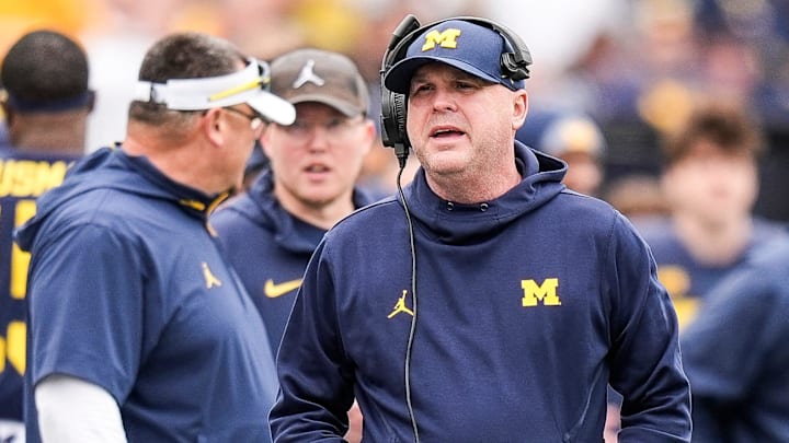 Michigan offensive coordinator Chip Lindsey talks to players on the sideline during the first half of the spring game at Michigan Stadium in Ann Arbor on Saturday, April 19, 2025.