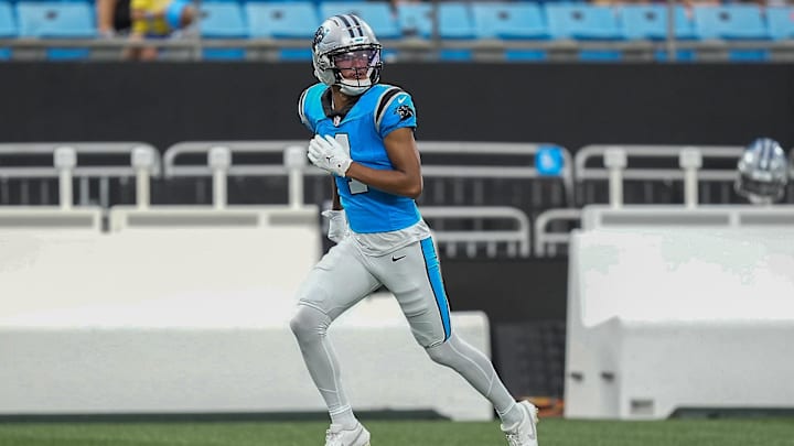 Aug 2, 2025; Charlottle, NC, USA; Carolina Panthers wide receiver Tetairoa McMillan (4) runs a pass route during Fanfest at Bank of America Stadium. Mandatory Credit: Jim Dedmon-Imagn Images