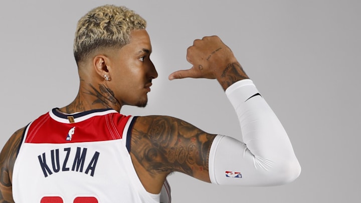 Sep 30, 2024; Washington, DC, USA; Washington Wizards forward Kyle Kuzma (33) poses for a portrait during Washington Wizards media day 2024 at Capital One Arena. Mandatory Credit: Geoff Burke-Imagn Images