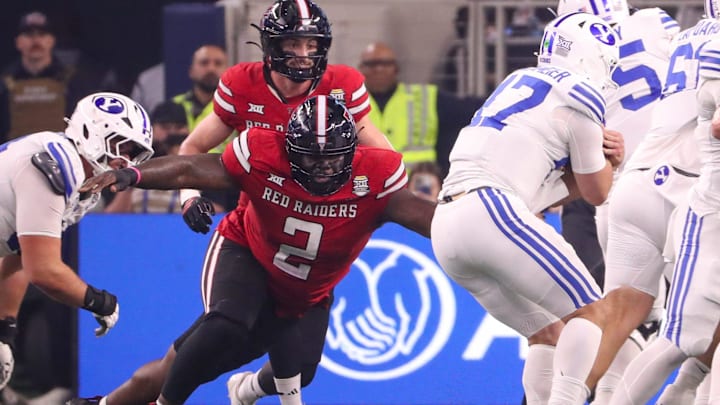Texas Tech's Lee Hunter attempts to make the tackle against BYU during the Big 12 Conference championship football game, Saturday, Nov. 6, 2025, at AT&T Stadium in Arlington. Texas Tech's Lee Hunter attempts to make the tackle against BYU during the Big 12 Conference championship football game, Saturday, Nov. 6, 2025, at AT&T Stadium in Arlington.