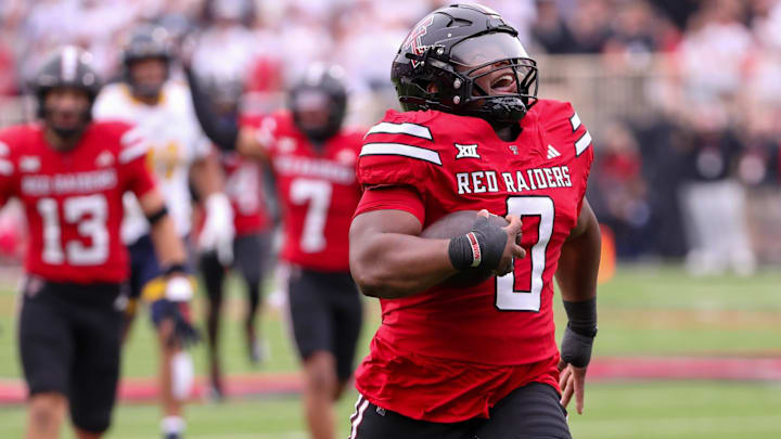 Texas Tech defensive lineman Skyler Gill-Howard returns an interception for a touchdown against Kent State, Saturday, September 6, 2025, at Jones AT&T Stadium.