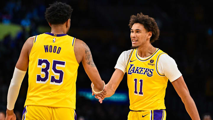 Nov 1, 2023; Los Angeles, California, USA;  Los Angeles Lakers forward Christian Wood (35) celebrates with Los Angeles Lakers center Jaxson Hayes (11) against the LA Clippers during the third quarter at Crypto.com Arena. Mandatory Credit: Jonathan Hui-Imagn Images