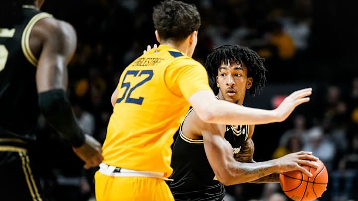 Juke Harris (2) looking to pass against the WVU Mountaineers, Dec. 6, 2025. Juke Harris (2) looking to pass against the WVU Mountaineers, Dec. 6, 2025.