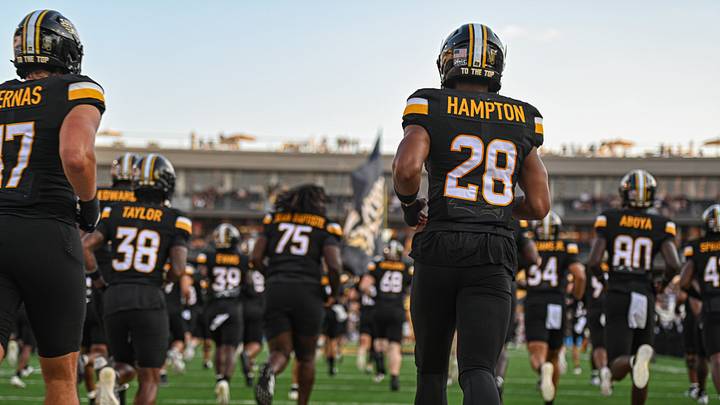 Southern Miss football players run out onto the field ahead of the Golden Eagles' Week 3 matchup against UConn at The Rock. Southern Miss football players run out onto the field ahead of the Golden Eagles' Week 3 matchup against UConn at The Rock.