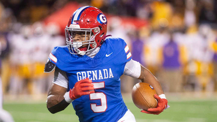 Grenada's Macaleb Taylor (5) gains yardage against Hattiesburg during the MHSAA 6A championship game in Hattiesburg, Miss., Saturday, Dec. 7, 2024.