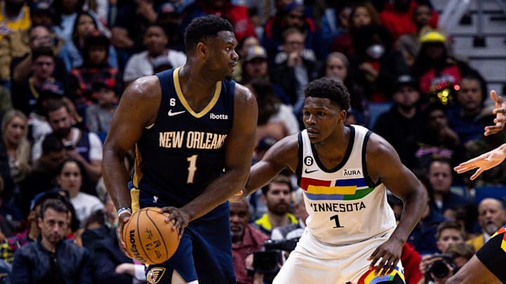 Dec 28, 2022; New Orleans, Louisiana, USA; New Orleans Pelicans forward Zion Williamson (1) looks to pass against Minnesota Timberwolves guard Anthony Edwards (1) during the second half at Smoothie King Center. Mandatory Credit: Stephen Lew-Imagn Images