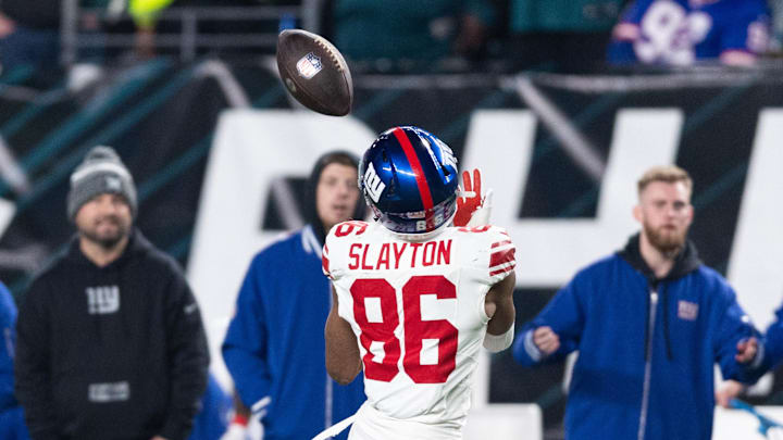 Dec 25, 2023; Philadelphia, Pennsylvania, USA; New York Giants wide receiver Darius Slayton (86) catches a touchdown pass against the Philadelphia Eagles during the fourth quarter at Lincoln Financial Field. Mandatory Credit: Bill Streicher-Imagn Images
