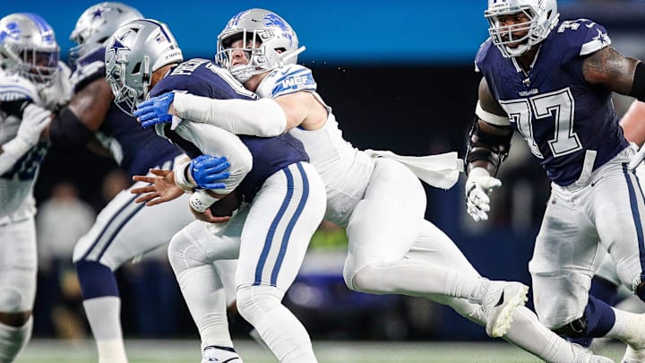 Lions defensive end Aidan Hutchinson sacks Cowboys quarterback Dak Prescott during the first half at