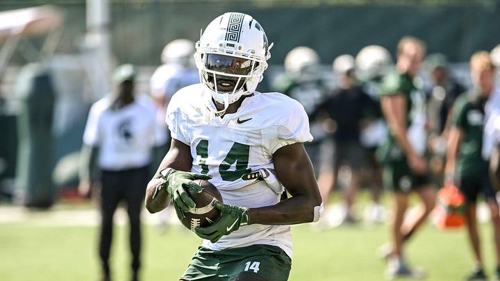 Michigan State's Malcolm Bell catches a ball during football practice on Monday, Aug. 11, 2025, in East Lansing.