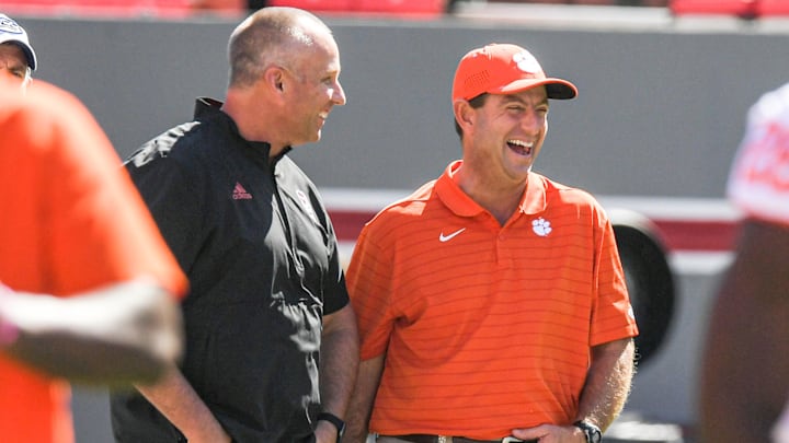 NC State football head coach Dave Doeren and Clemson's Dabo Swinney NC State football head coach Dave Doeren and Clemson's Dabo Swinney