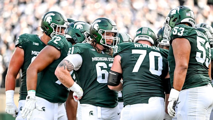 Michigan State's offensive line, from left, Ashton Lepo, Dallas Fincher, Tanner Miller, Luke Newman and Brandon Baldwin huddle up during the fourth quarter in the game against Prairie View A&M on Saturday, Sept. 14, 2024, at Spartan Stadium in East Lansing.