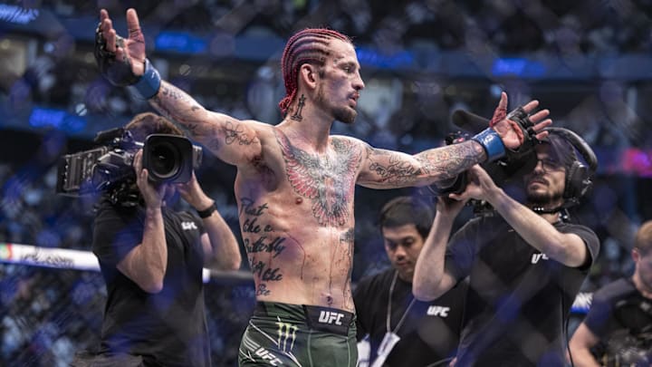 Oct 22, 2022; Abu Dhabi, UAE;  Sean O'Malley (blue gloves) defeats Petr Yan (red gloveS) during UFC