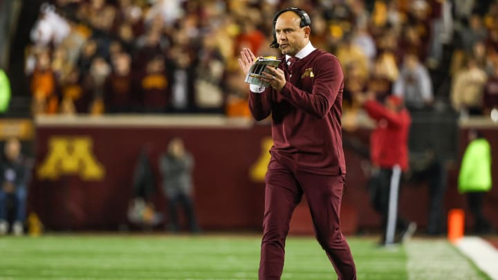 Oct 7, 2023; Minneapolis, Minnesota, USA; Minnesota Golden Gophers head coach P.J. Fleck looks on during the second quarter against the Michigan Wolverines at Huntington Bank Stadium. Oct 7, 2023; Minneapolis, Minnesota, USA; Minnesota Golden Gophers head coach P.J. Fleck looks on during the second quarter against the Michigan Wolverines at Huntington Bank Stadium.