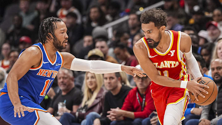 Nov 6, 2024; Atlanta, Georgia, USA; Atlanta Hawks guard Trae Young (11) is defended by New York Knicks guard Jalen Brunson (11) during the first half at State Farm Arena. Mandatory Credit: Dale Zanine-Imagn Images