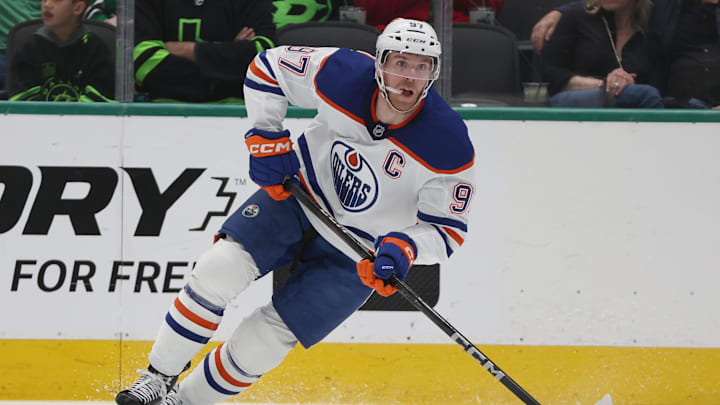 Oct 19, 2024; Dallas, Texas, USA; Edmonton Oilers center Connor McDavid (97) controls the puck against the Dallas Stars in the first period at American Airlines Center. Mandatory Credit: Tim Heitman-Imagn Images