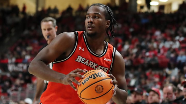 Dec 28, 2023; Lubbock, Texas, USA;  Sam Houston Bearkats guard Davon Barnes (2) works the ball in