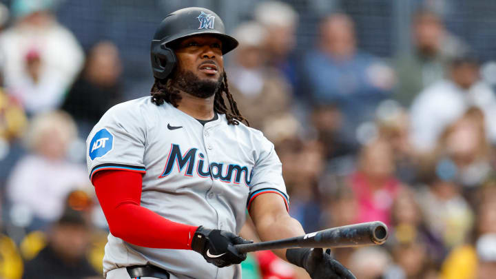 May 28, 2024; San Diego, California, USA;  Miami Marlins first baseman Josh Bell (9) watches a ball fly deep out of bounds in the first inning against the San Diego Padres at Petco Park