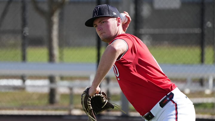Washington Nationals pitcher Brad Lord (61) takes infield practice during spring training in West Palm Beach, Fla., on Feb. 15, 2025. Washington Nationals pitcher Brad Lord (61) takes infield practice during spring training in West Palm Beach, Fla., on Feb. 15, 2025.