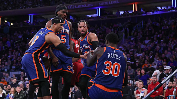 Jan 27, 2024; New York, New York, USA; New York Knicks forward Julius Randle (30) is helped up by