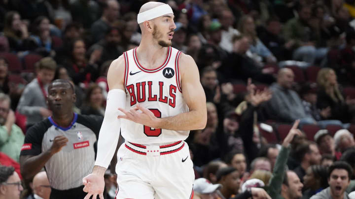 Mar 16, 2024; Chicago, Illinois, USA; Chicago Bulls guard Alex Caruso (6) gestures after making a three point basket against the Washington Wizards during the second half at United Center. Mandatory Credit: David Banks-USA TODAY Sports