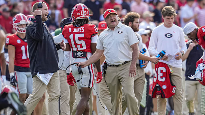 Aug 30, 2025; Athens, Georgia, USA; Georgia Bulldogs head coach Kirby Smart (center) reacts during the game against the Marshall Thundering Herd at Sanford Stadium. Mandatory Credit: Dale Zanine-Imagn Images