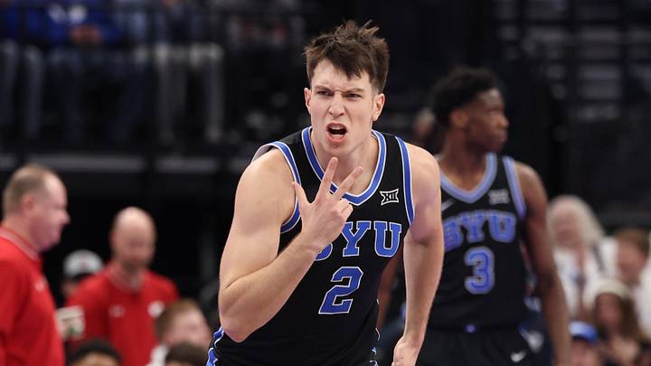 Nov 21, 2025; Salt Lake City, Utah, USA; BYU Cougars forward Tyler Mrus (2) reacts to a basket against the Wisconsin Badgers during the first half at Delta Center. Mandatory Credit: Rob Gray-Imagn Images