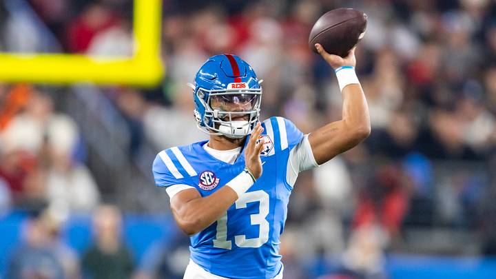 Jan 8, 2026; Glendale, AZ, USA; Mississippi Rebels quarterback Austin Simmons (13) against the Miami Hurricanes during the 2026 Fiesta Bowl and semifinal game of the College Football Playoff at State Farm Stadium. Mandatory Credit: Mark J. Rebilas-Imagn Images Jan 8, 2026; Glendale, AZ, USA; Mississippi Rebels quarterback Austin Simmons (13) against the Miami Hurricanes during the 2026 Fiesta Bowl and semifinal game of the College Football Playoff at State Farm Stadium. Mandatory Credit: Mark J. Rebilas-Imagn Images
