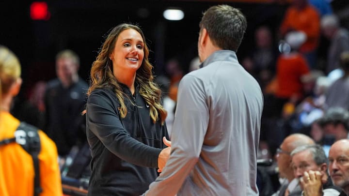 Tennessee coach Kim Caldwell and Belmont coach Bart Brooks shake hands before a NCAA women's basketball between the Tennessee Lady Vols and Belmont Bruins at Thompson-Boling Arena at Food City Center in Knoxville, Tenn. on Nov. 13, 2025.