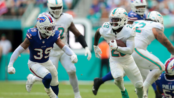 Cam Lewis, a new Bears defensive back, tries to run down Dolphins running back De'Von Achane for Buffalo last season.