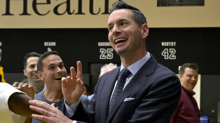 Jun 24, 2024; El Segundo, CA, USA; Los Angeles Lakers head coach JJ Redick laughs with members of the media following his introductory news conference at the UCLA Health Training Center. Mandatory Credit: Jayne Kamin-Oncea-USA TODAY Sports