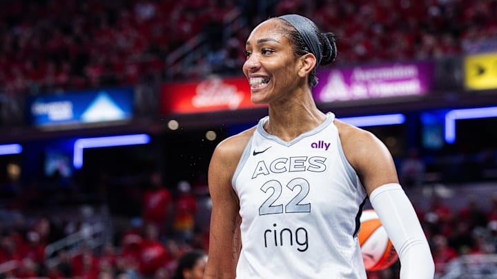 Sep 28, 2025; Indianapolis, Indiana, USA; Las Vegas Aces center A'ja Wilson (22) celebrates a basket in the second half during game four against the Indiana Fever of the second round for the 2025 WNBA Playoffs at Gainbridge Fieldhouse. Mandatory Credit: Trevor Ruszkowski-Imagn Images