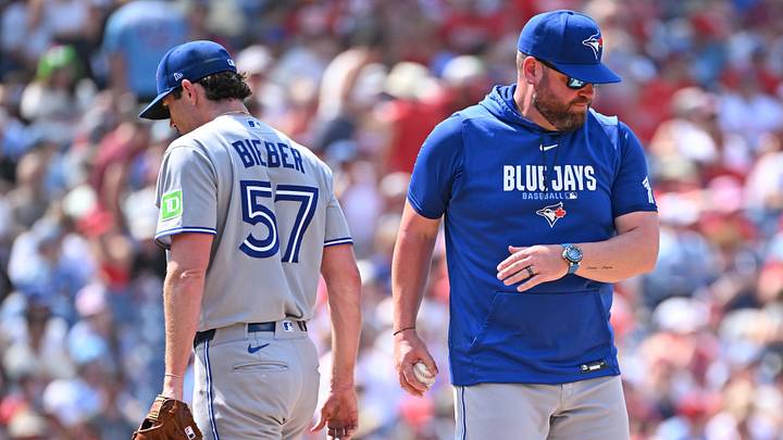 Aug 9, 2026; Philadelphia, Pennsylvania, USA; Toronto Blue Jays manager John Schneider (14) take the ball from pitcher Shane Bieber (57) against the Philadelphia Phillies during the sixth inning at Citizens Bank Park. Mandatory Credit: Eric Hartline-Imagn Images