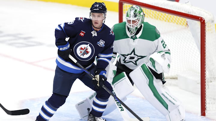 Oct 9, 2025; Winnipeg, Manitoba, CAN; Winnipeg Jets centre Jonathan Toews looks for a shot in front of Dallas Stars goaltender Jake Oettinger (29) in the second period at Canada Life Centre. Mandatory Credit: James Carey Lauder-Imagn Images